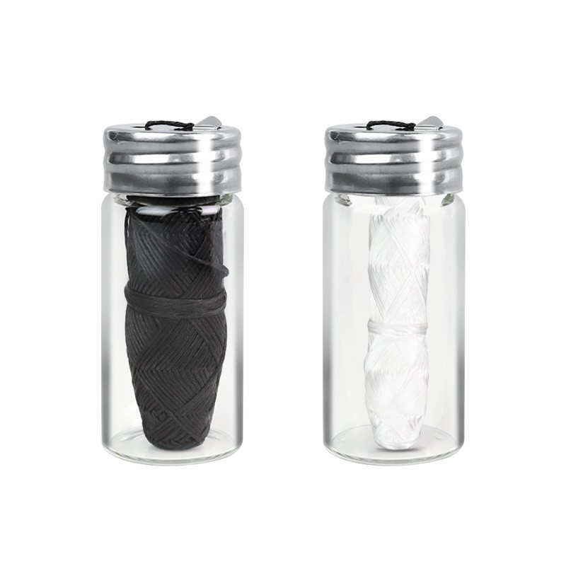 Tandheelkundige floss in glazen pot